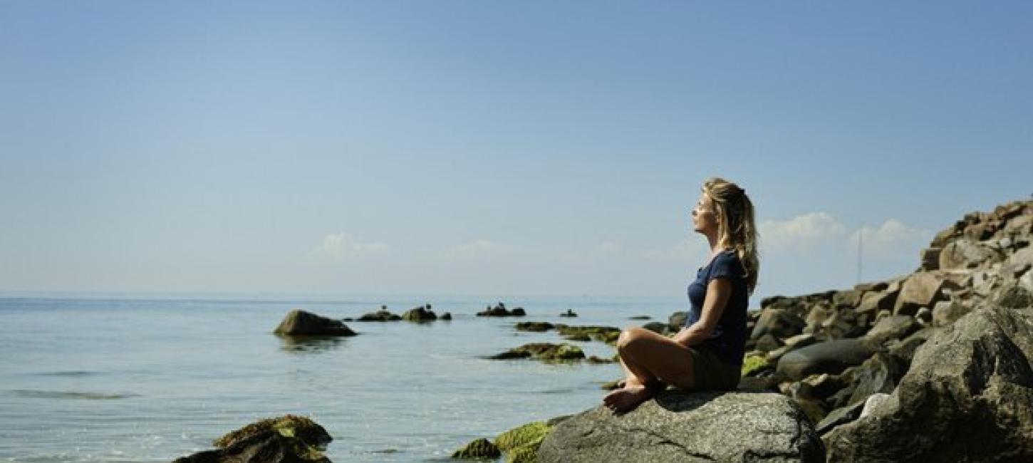 Woman sitting in the sun 