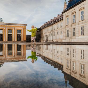 Mirrored image in puddle at Thorvaldsens Museum